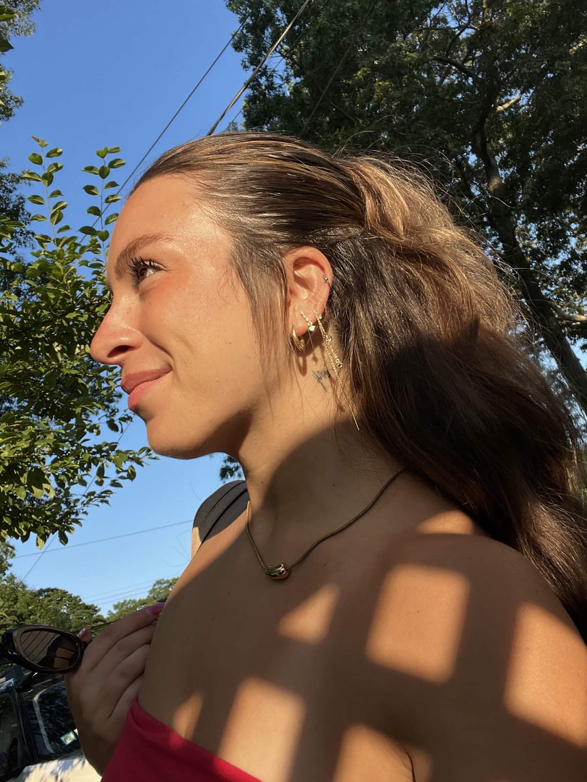 Ally Isbit outdoors in natural light